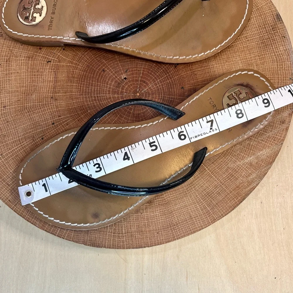 Tory Burch Black Patent Leather Flip Sandals with Tan Footbed